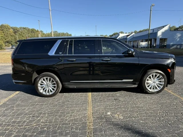 2022 Cadillac Escalade Sport ESV front angle with chrome wheels